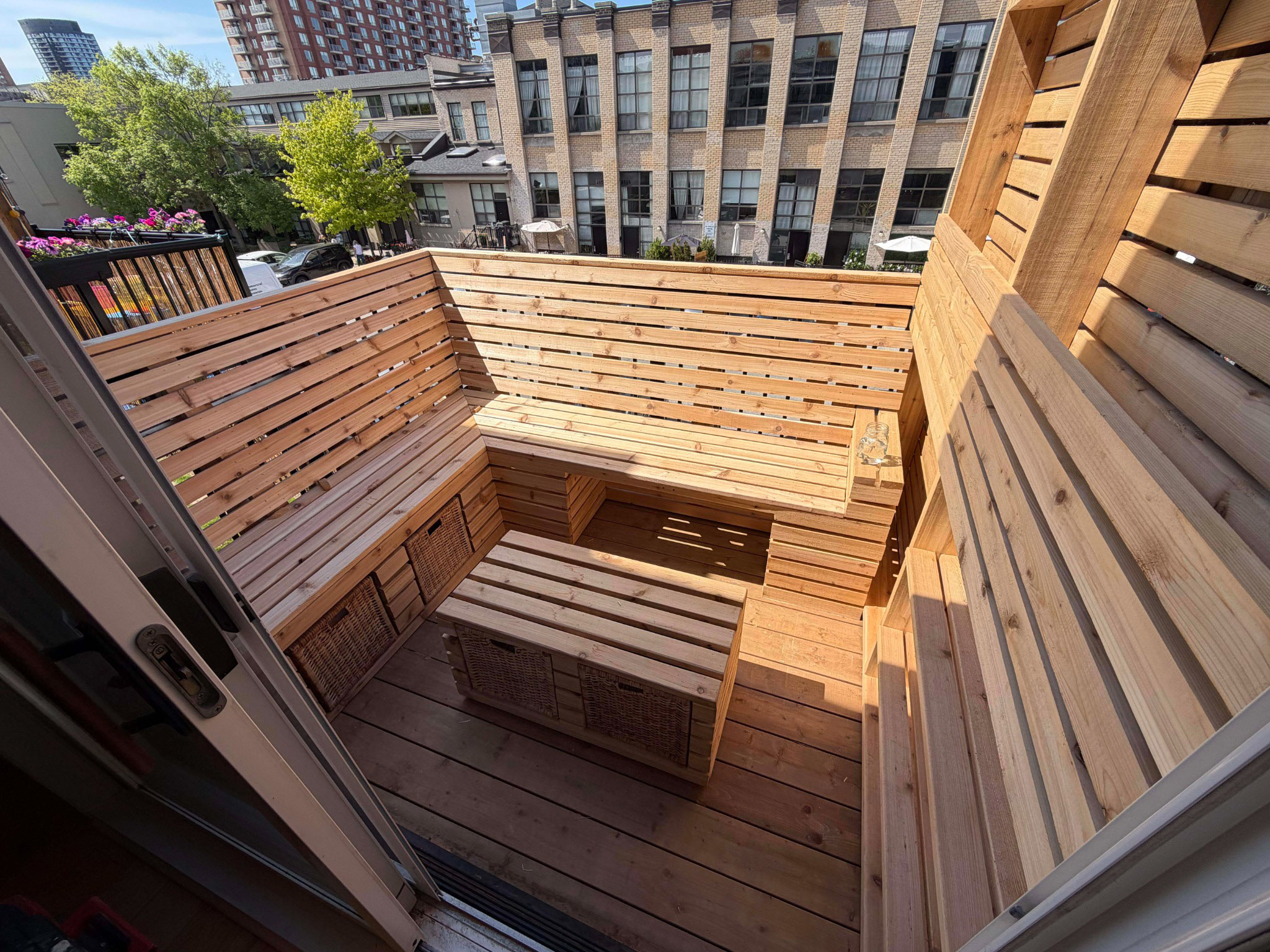 Custom cedar balcony seating and privacy screens